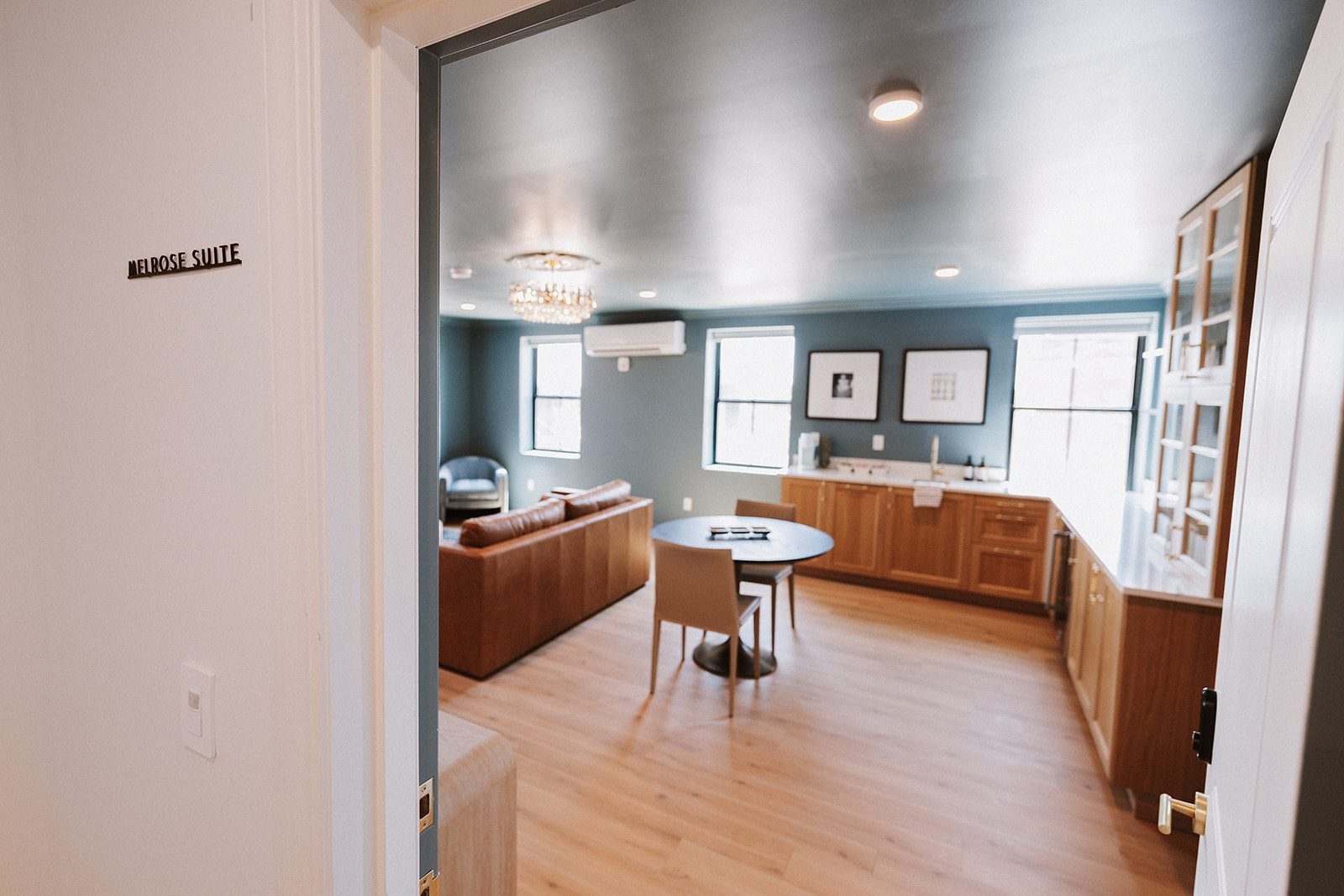Boutique hotel suite inside Melrose Abbey, Kansas City — the wedding party stays on site